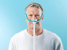 Load image into Gallery viewer, Man wearing the Fisher and Paykel Evora Nasal Mask