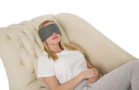 Woman wearing Luxury Memory Foam Anti-Fatigue Eye Mask