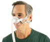Man smiling wearing ApneaSeal custom mask