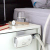 Caddy being used to secure Air mini on front of bedside table