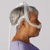 A woman wearing Philips DreamWear Silicone mask
