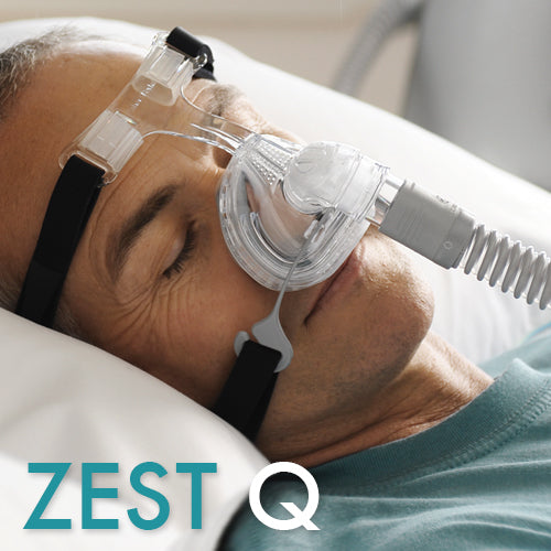 Man sleeping wearing Fisher and Paykel Zest Q Nasal Mask